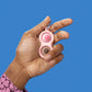 NIPPLE DIMPLE, pink frame, diverse buttons