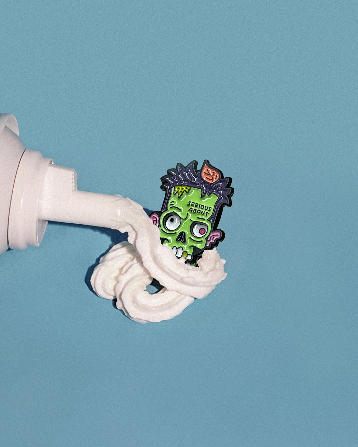 ZOMBIE, SLIDING ENAMEL PIN